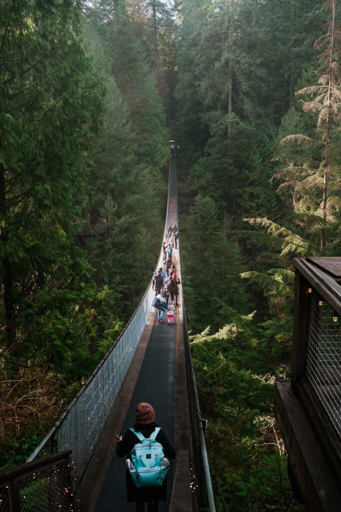 Visitors walking on the Cliffwalk at Capilano Suspension Bridge in North Vancouver