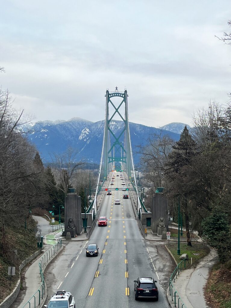 Cars crossing Lions Gate Bridge from Downtown Vancouver to North Vancouver