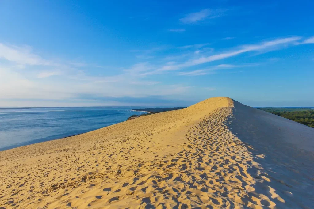 Panoramic view from the Dune du Pilat overlooking Arcachon Bay and the Atlantic coastline in France