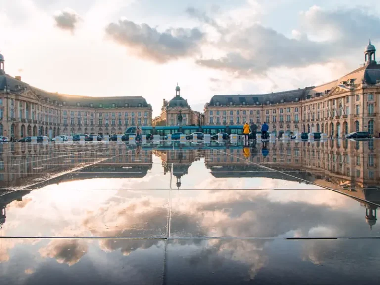 Place de la Bourse reflected in the Miroir d'Eau water mirror in Bordeaux, France