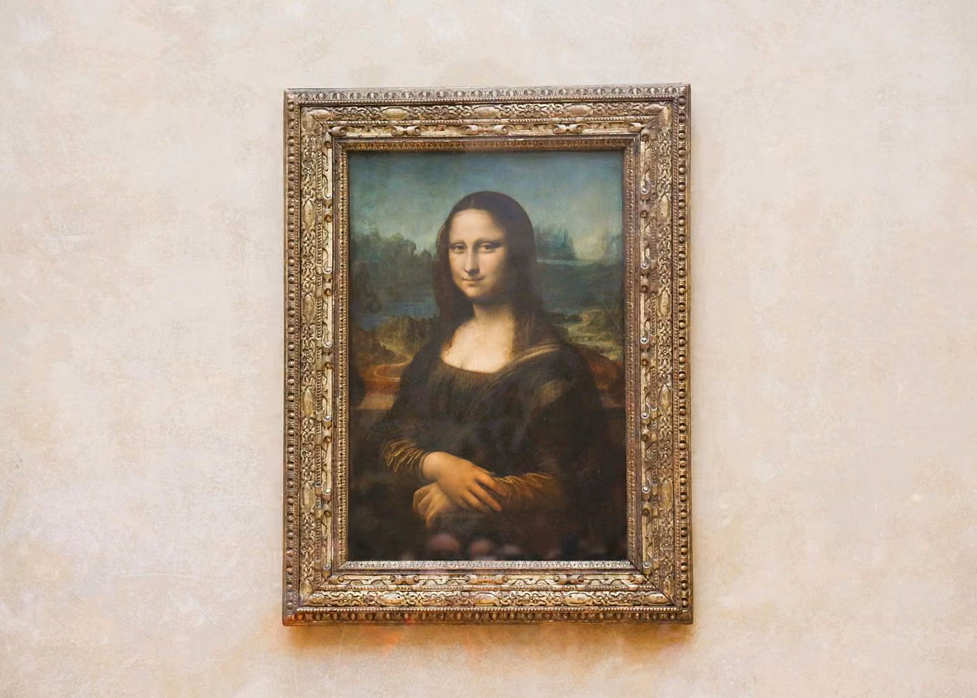 Mona Lisa painting by Leonardo da Vinci displayed at the Louvre Museum in Paris