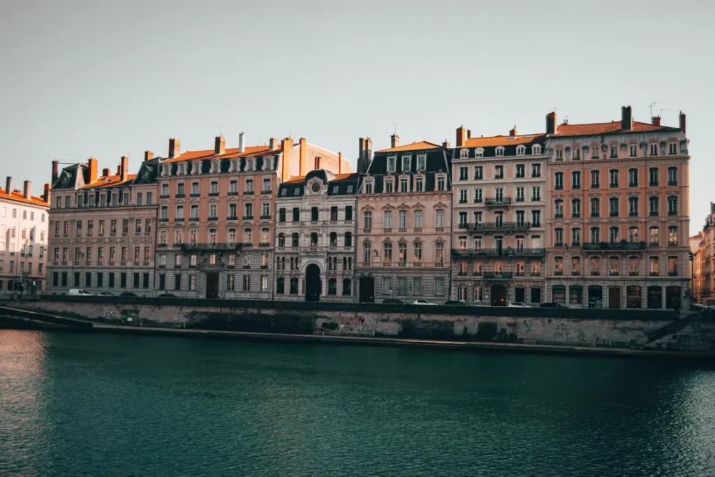 Historic Lyon buildings with colorful facades along the Saône River in France