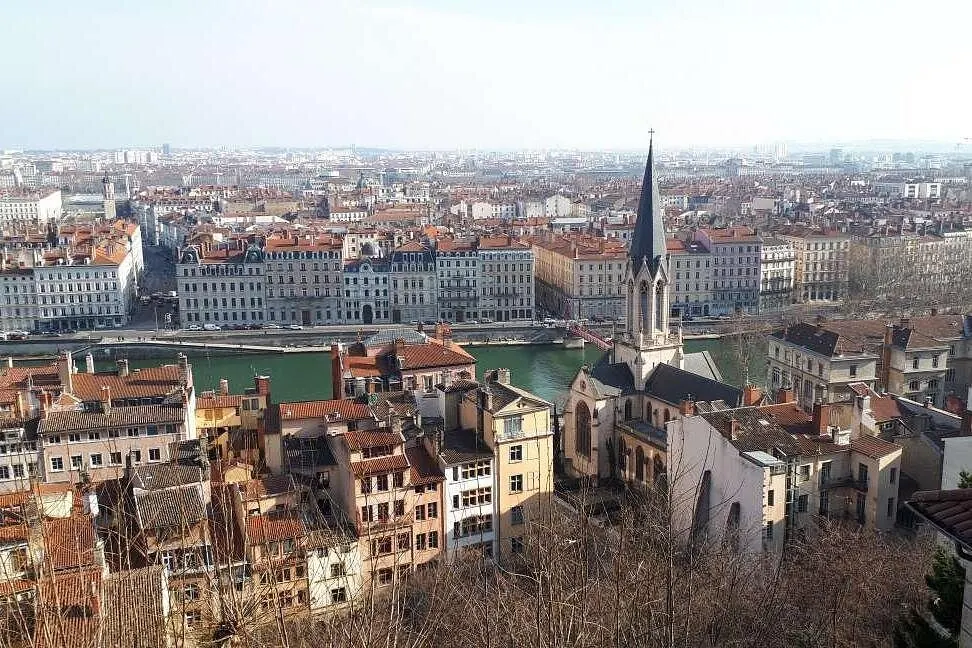 Panoramic view of Vieux Lyon rooftops, Saint-Paul Church and the Saône River in Lyon, France