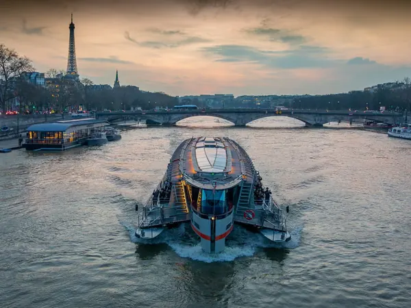 Sightseeing cruise boat on the Seine River in Paris