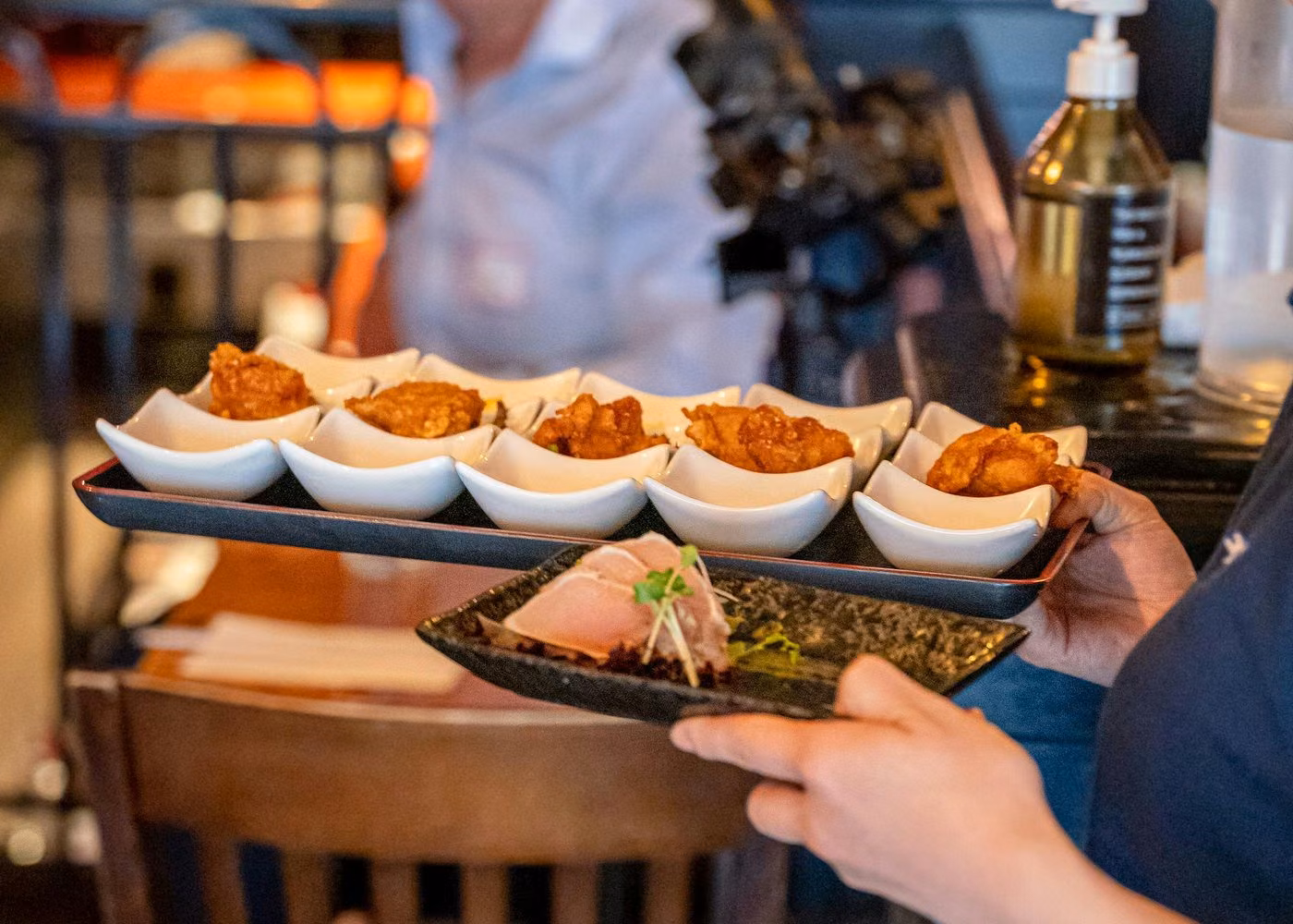 Assorted gourmet appetizers served in small tasting bowls during a Vancouver Gastown food tour