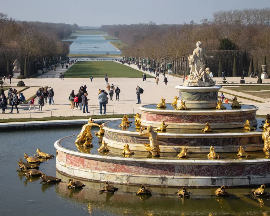 Latona Fountain with gilded sculptures overlooking the gardens of the Palace of Versailles